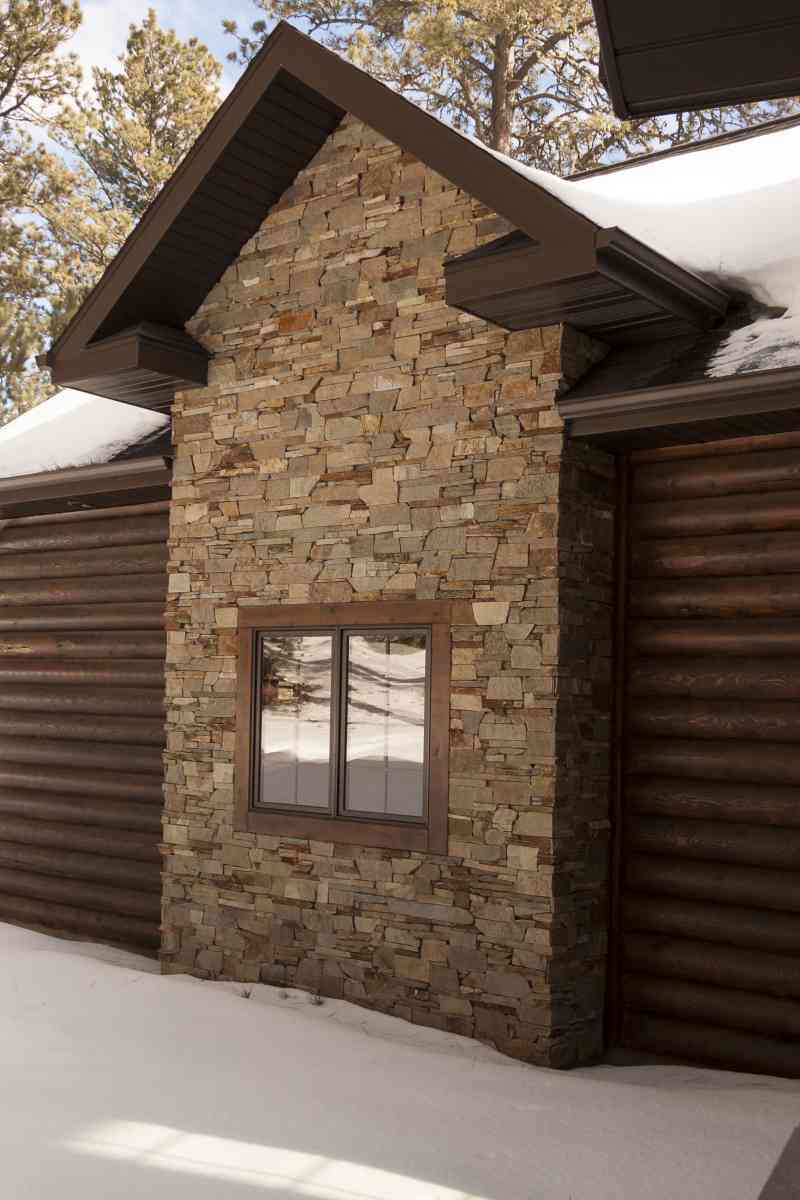 The exterior stone wall accent.