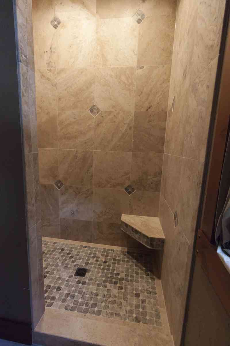 The meticulously tiled shower in the master bath is just beautiful!