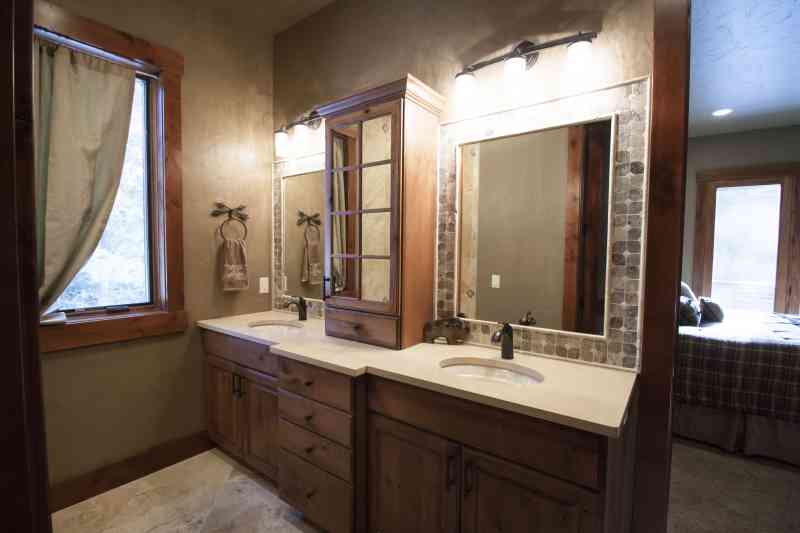 The double master vanities with custom tile work.