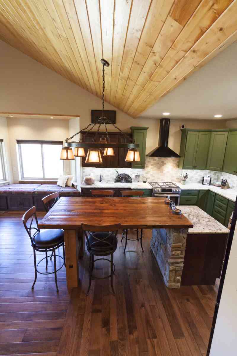 An open-concept kitchen and living area is complimented by the high ceilings.