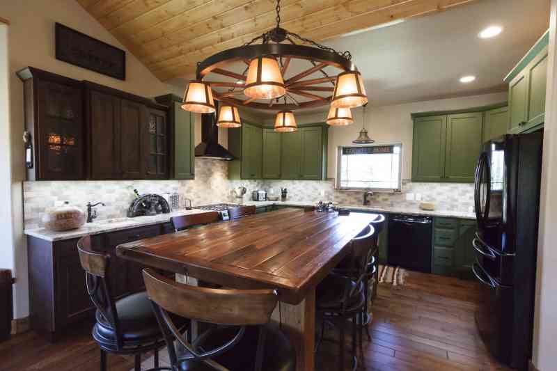 The gorgeous island table is the focal point for this kitchen!