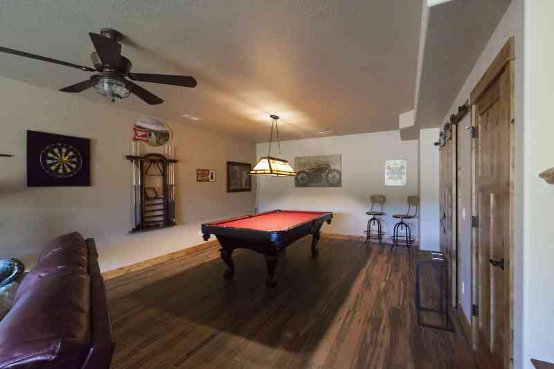 The basement features a fun billiard room for entertaining.
