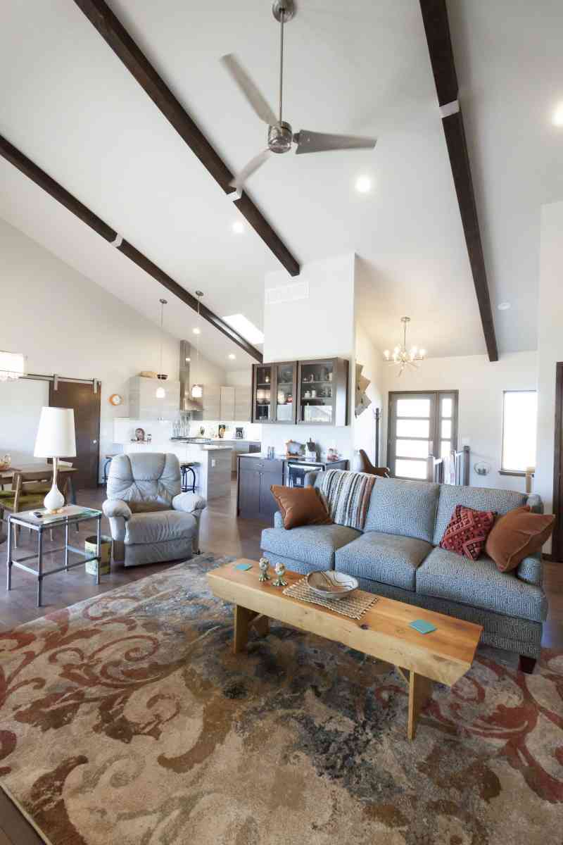 The rustic rafters help bring even more height to the vaulted ceiling!