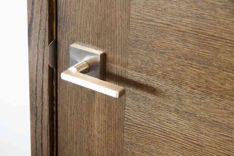 The brushed nickel door levers add the finishing touch for every door in this home!