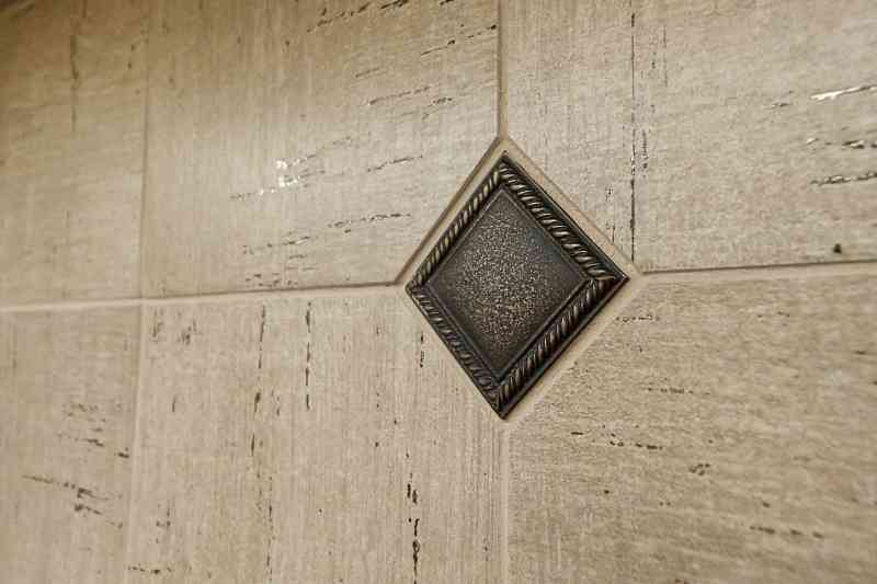 The beautiful detail on a master bath's walk-in shower.