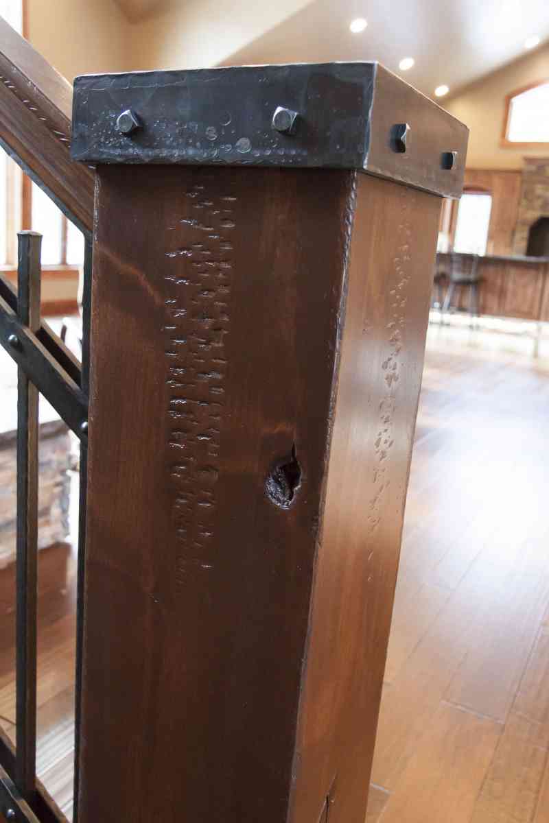 Absolutely gorgeous hammered distressing on the railing posts!