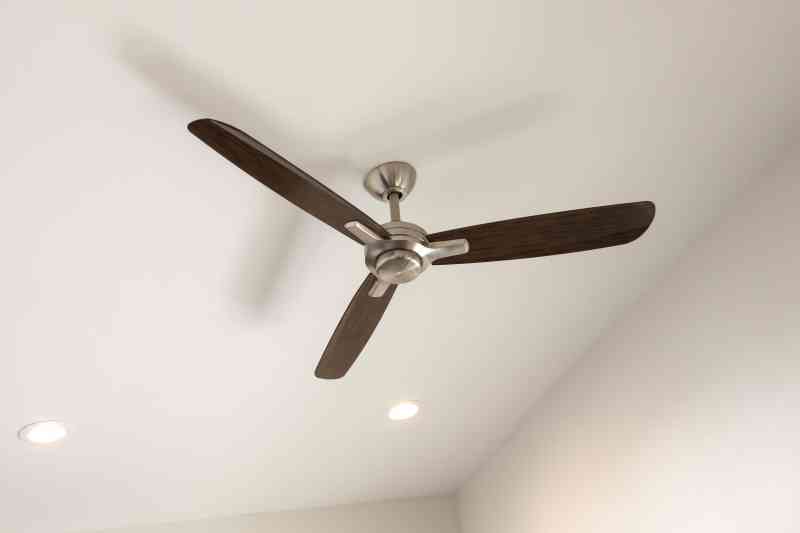 The modern ceiling fan in the breezeway.