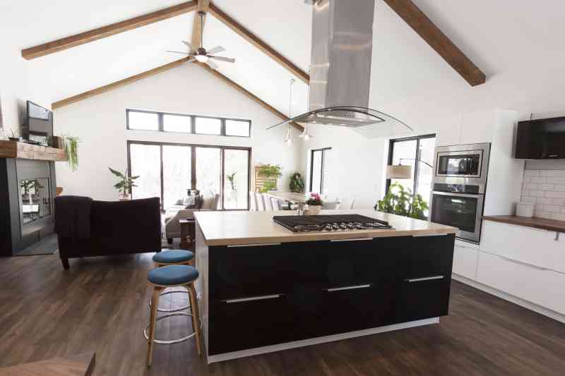 This large island overlooks the open living room and sliding glass doors that open up to the canyon view!